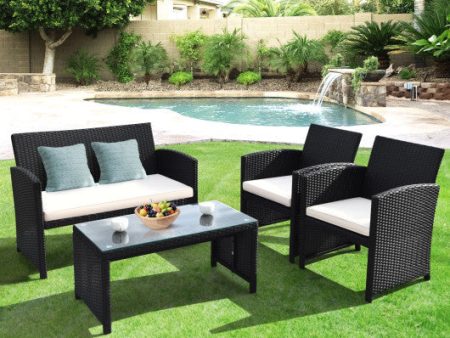 4 Pieces Rattan Patio Furniture Set with Weather Resistant Cushions and Tempered Glass Tabletop-White Fashion